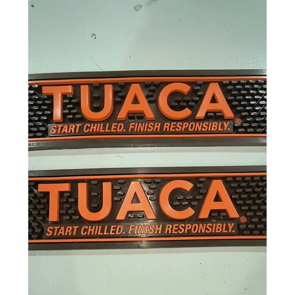 Tuaca liqueur branded